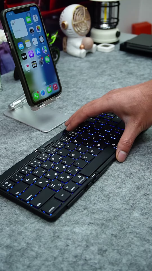 Compact Wireless Keyboard with Mobile Stand – Perfect for On-the-Go Productivity